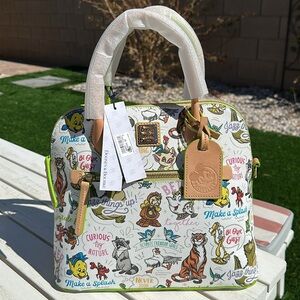 Disney Pass Holder Dooney & Bourke purse.